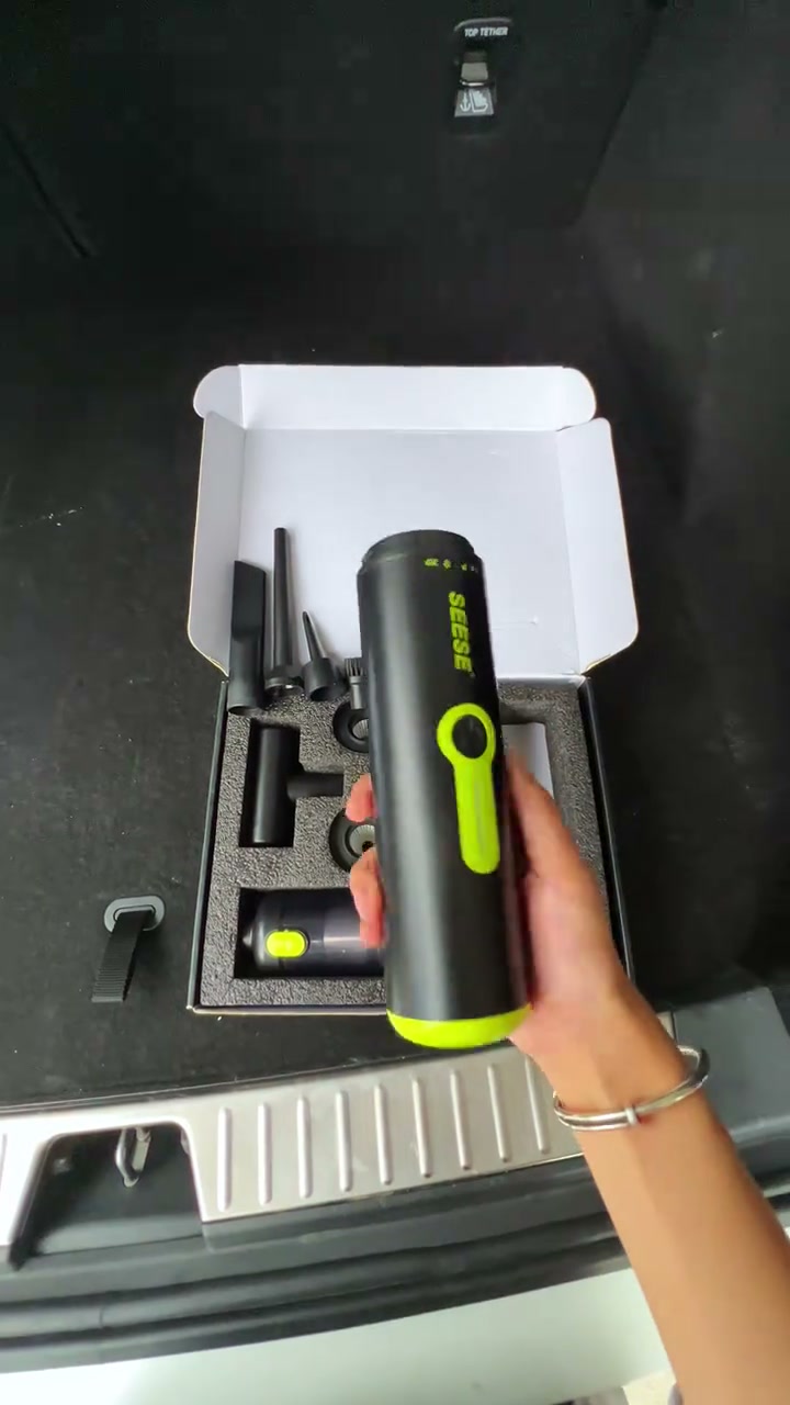 SEESE vacuum and included attachments in an open box